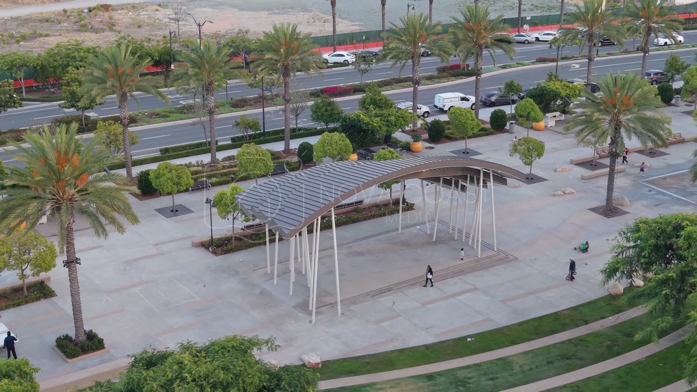 Architectural Detail of Civita Park’s Arched Canopy and Palm Plaza – Elevated Perspective