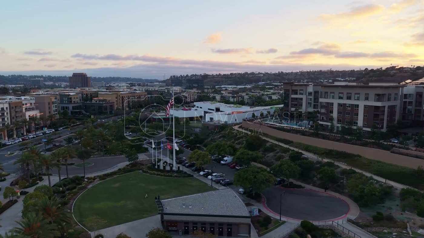 Civita Hilltop Residences Above the Community Garden Terraces at Dusk – Golden Hour Frame
