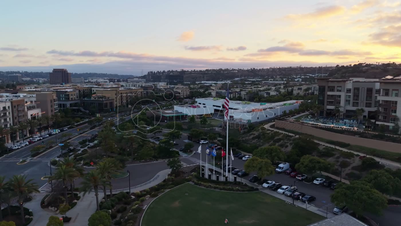 Civita Hilltop Residences Above the Community Garden Terraces at Dusk – High-Angle Panorama