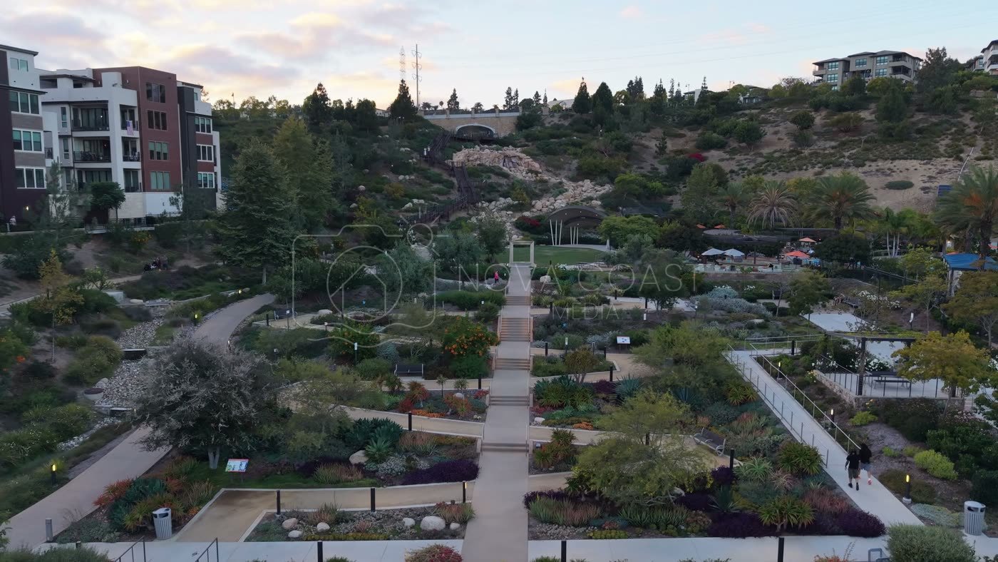 Civita Terraced Botanical Gardens and Winding Pathways at Twilight – Aerial View