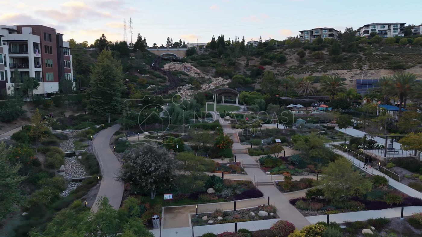 Civita Terraced Botanical Gardens and Winding Pathways at Twilight – Wide Establishing Frame
