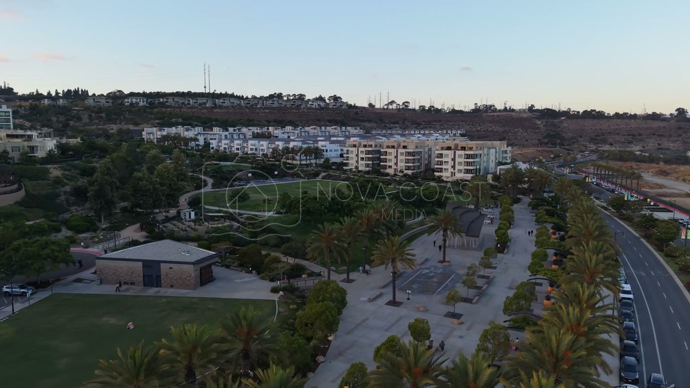 Civita Park Great Lawn and Flag Court Beside the Palm Promenade – Wide Establishing Frame