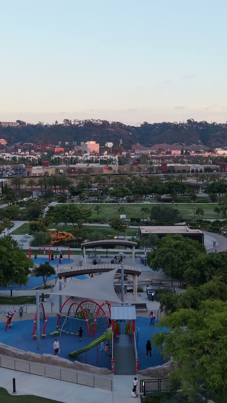 Civita Park Playground and Green Space Framed by Mission Valley Hills – Aerial View (Vertical)