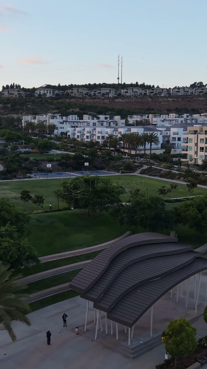 Civita Park Great Lawn and Flag Court Beside the Palm Promenade – Golden Hour Frame (Vertical)