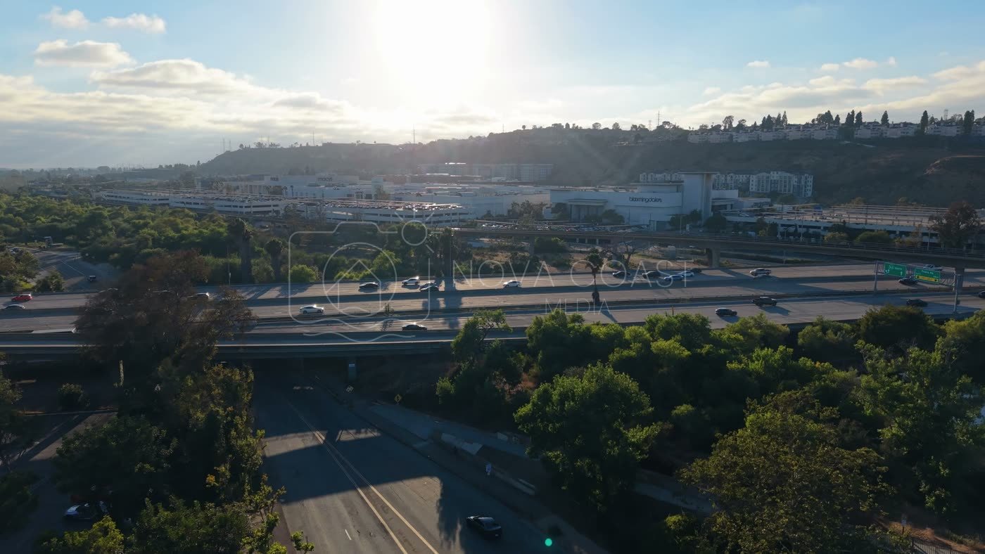 Fashion Valley Mall and the Freeway Interchange Under Morning Sun – Aerial View