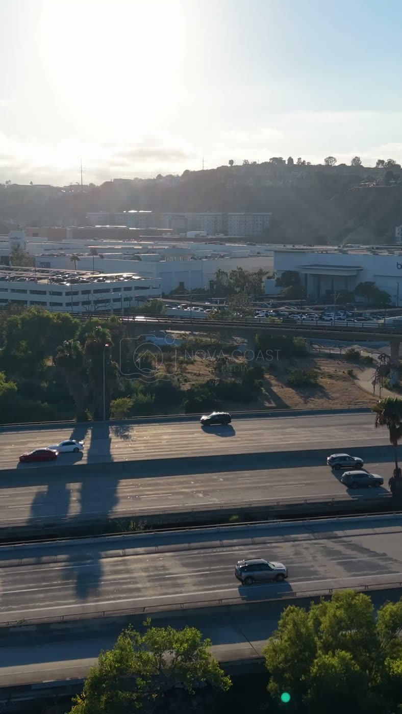 Fashion Valley Mall and the Freeway Interchange Under Morning Sun – Wide Establishing Frame (Vertical)
