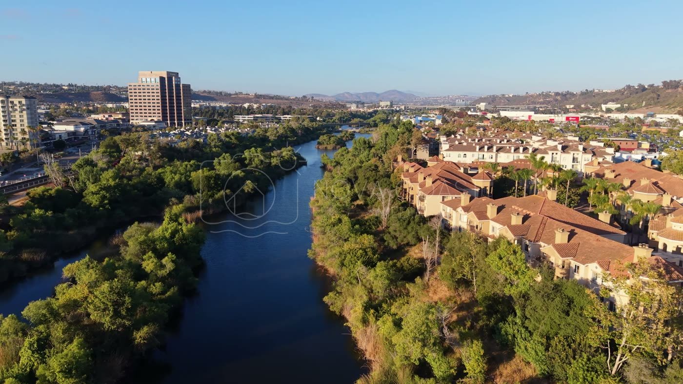 San Diego River Winding Past Riverside Townhomes in Mission Valley – Elevated Perspective
