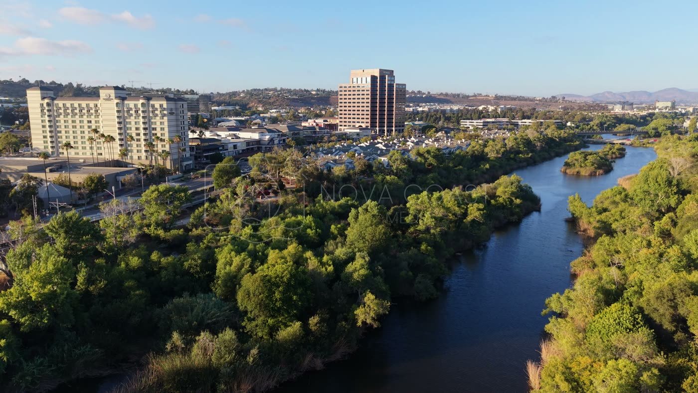 Lush San Diego River Bend Below the Mission Valley Skyline – Aerial View