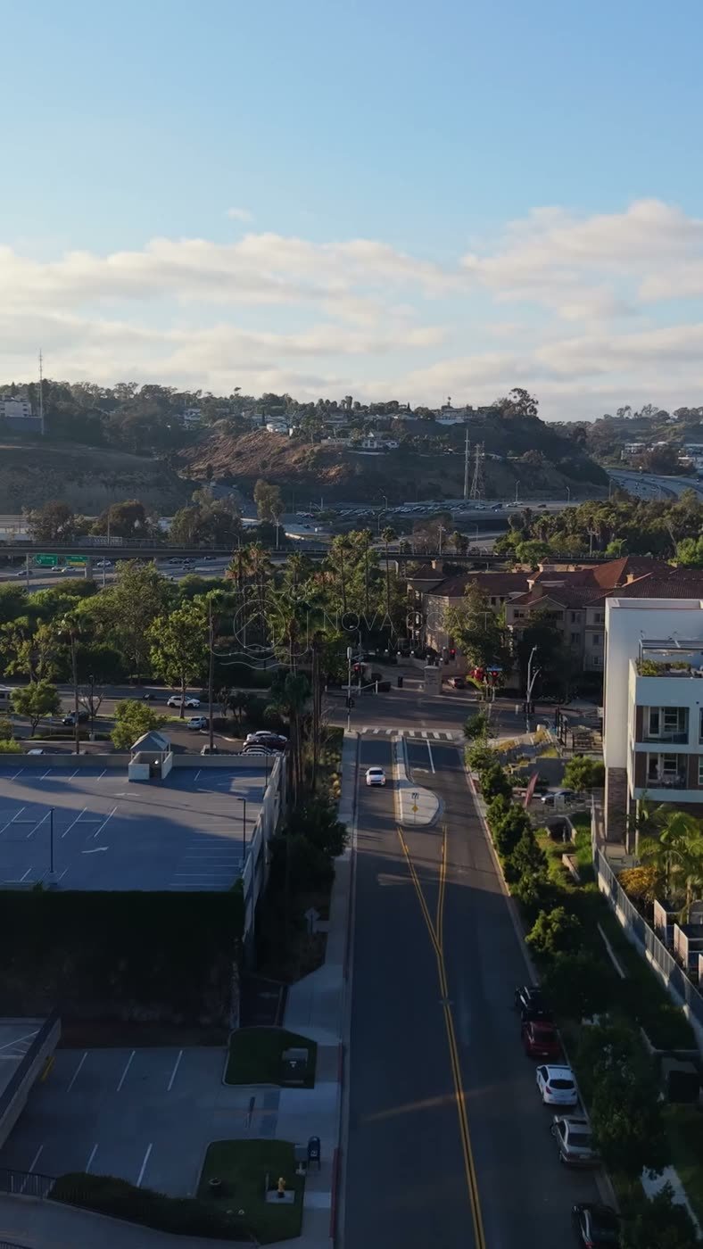 Mission Valley Streetscape with Apartments and Freeway Beyond at Morning – Aerial View (Vertical)