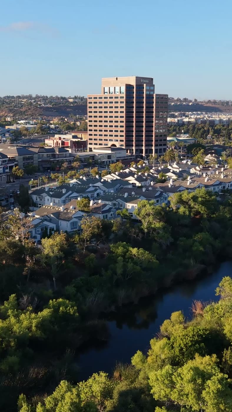 Mission Valley Hotel District and Trolley Along the San Diego River – Wide Establishing Frame (Vertical)