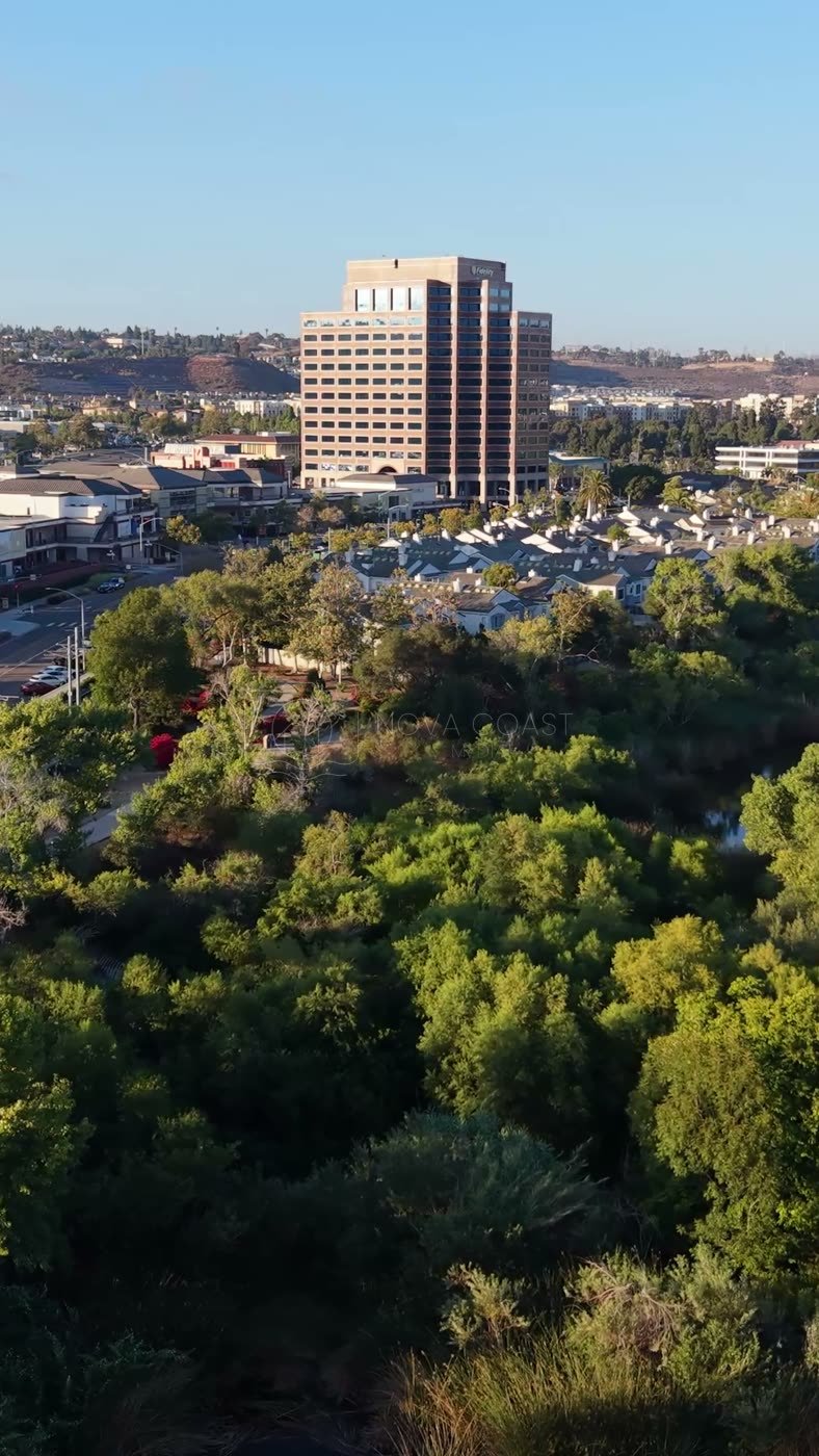 Lush San Diego River Bend Below the Mission Valley Skyline – Wide Establishing Frame (Vertical)