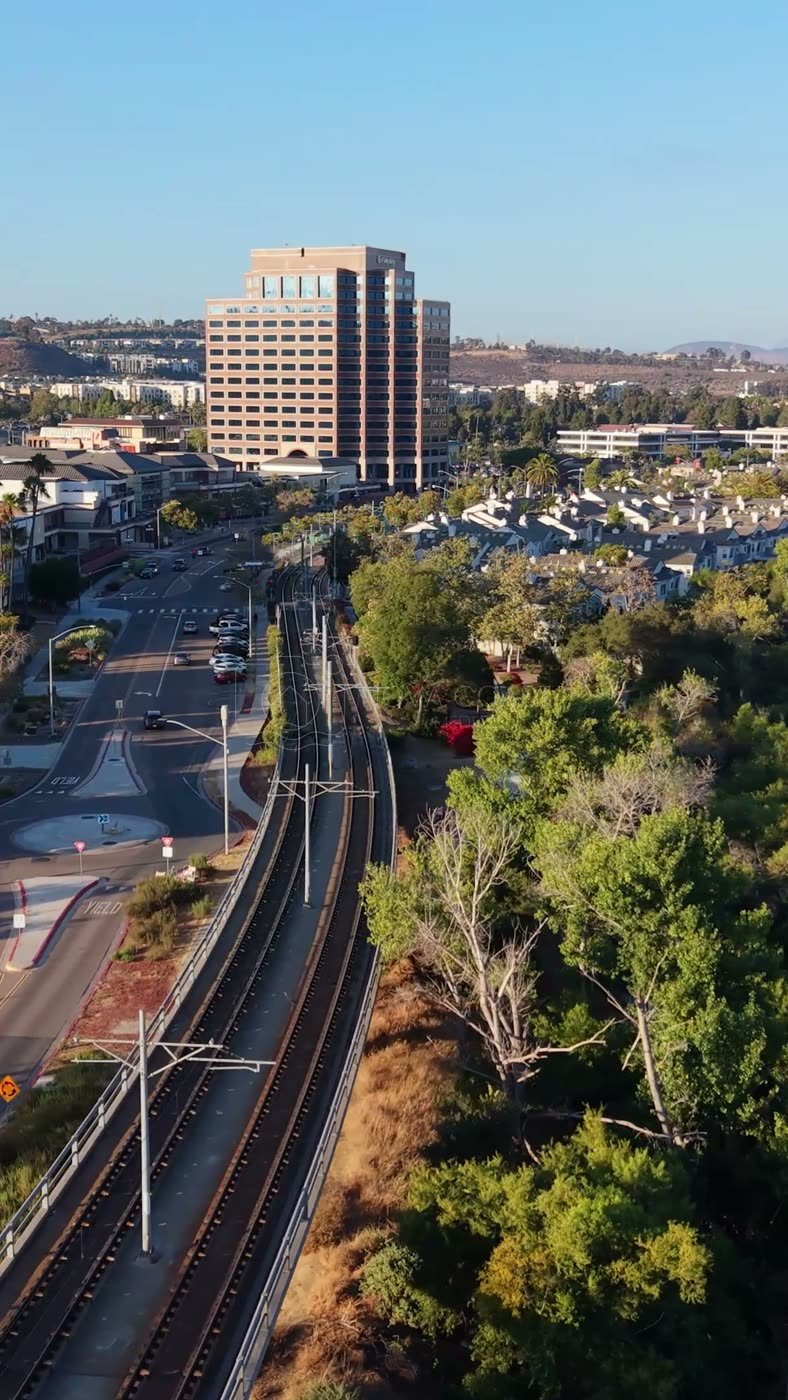 Lush San Diego River Bend Below the Mission Valley Skyline – Golden Hour Frame (Vertical)