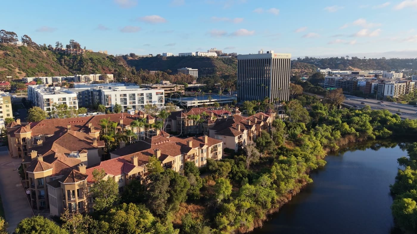 Riverside Mediterranean Apartments and Pool Along the San Diego River – Aerial View