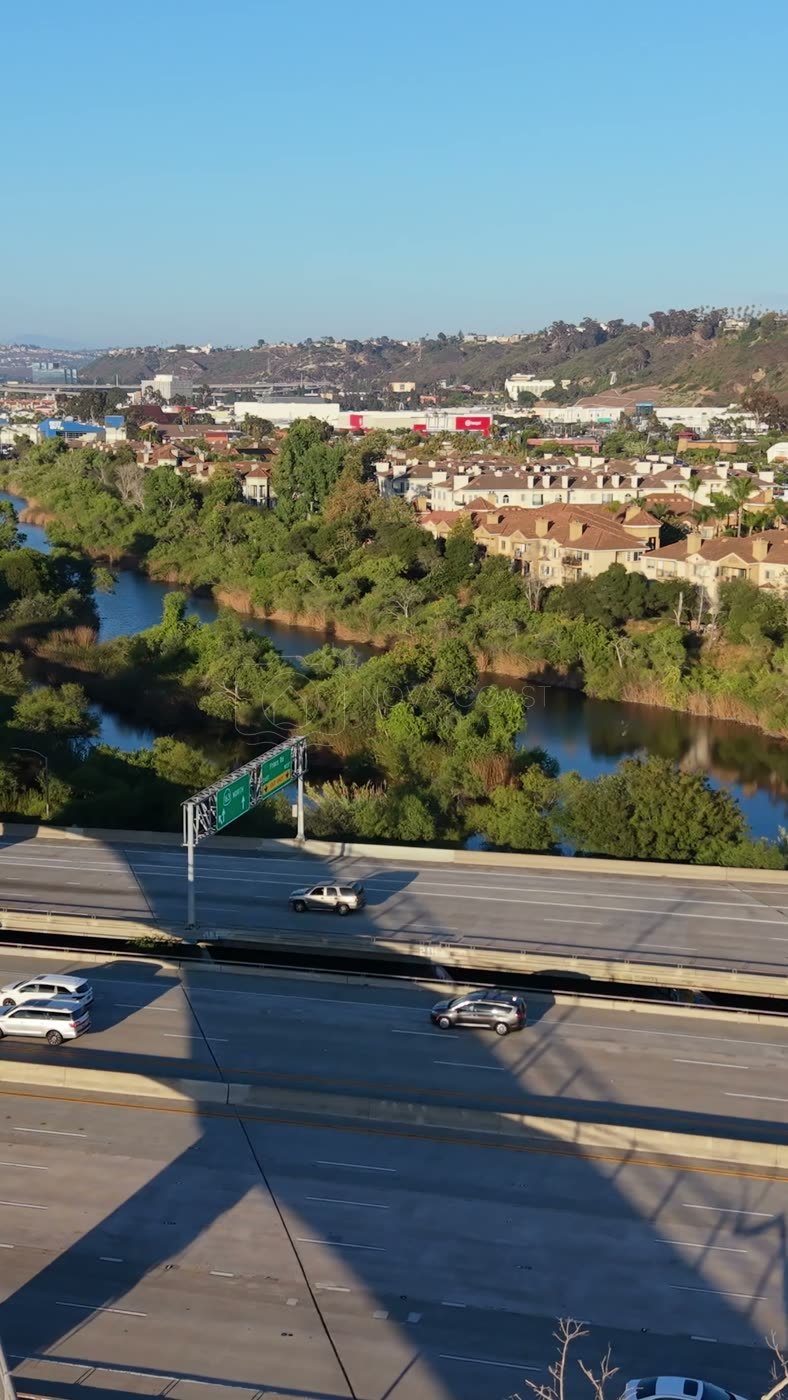 San Diego River and the Interstate 8 Bridge Beside Mission Valley Apartments – Aerial View (Vertical)