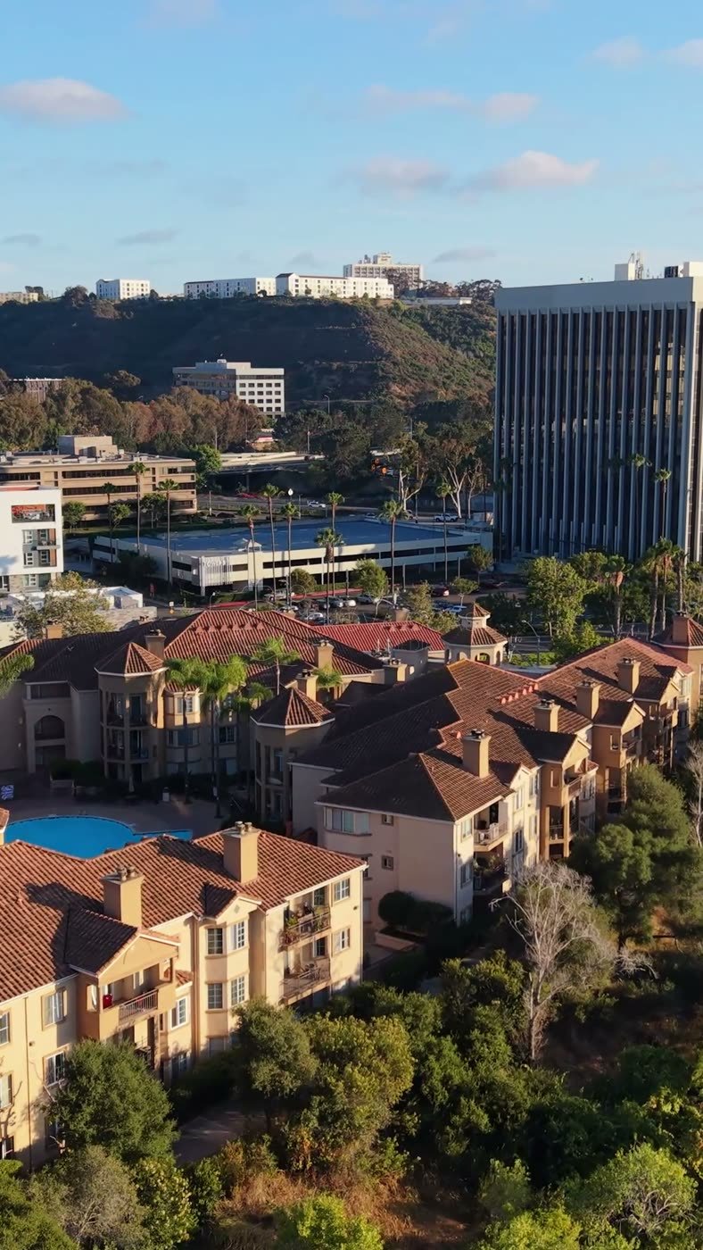 Riverside Mediterranean Apartments and Pool Along the San Diego River – Elevated Perspective (Vertical)