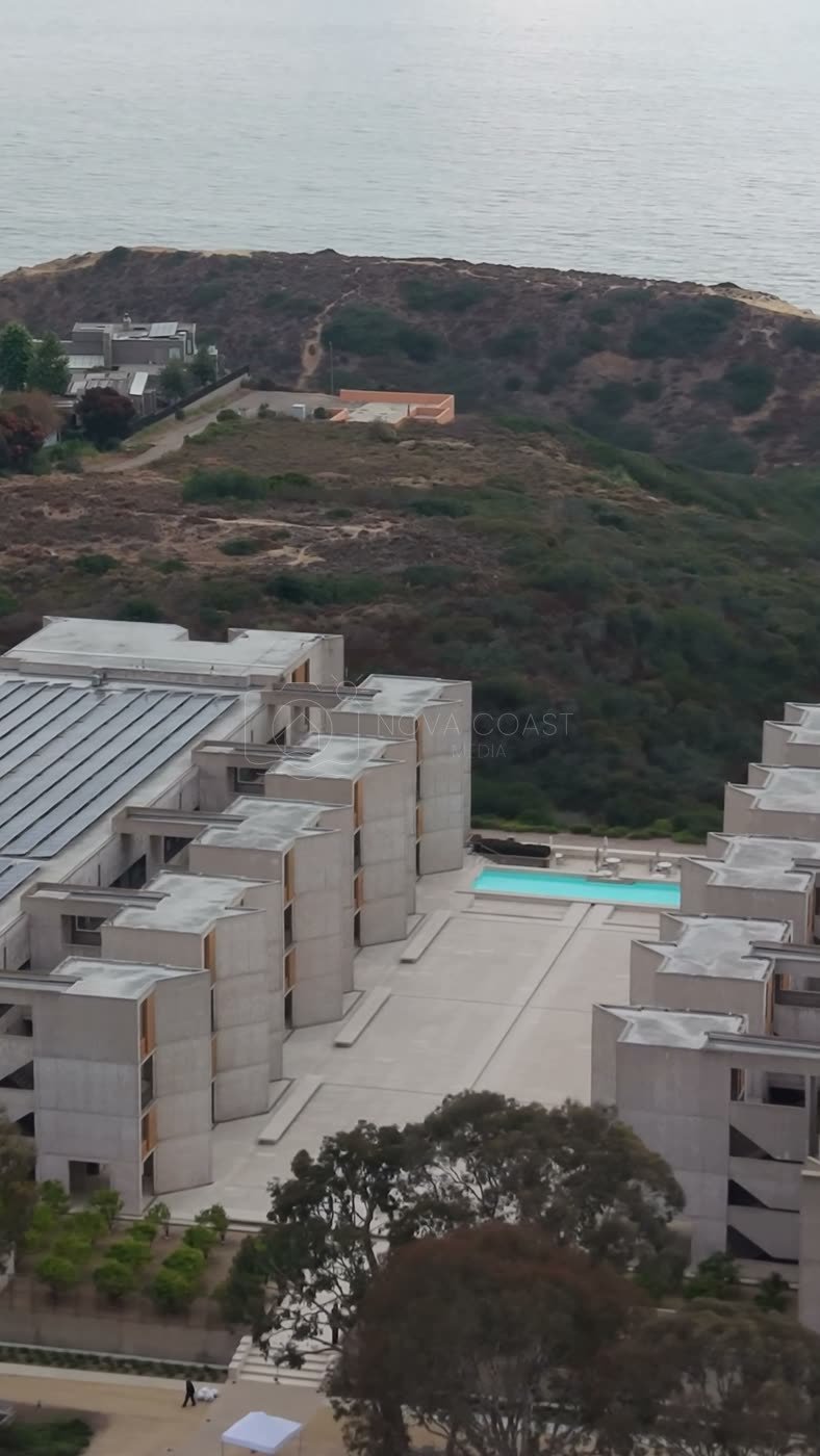 Aerial Profile of the Salk Institute Above La Jolla Shores – Sweeping Aerial (Vertical)