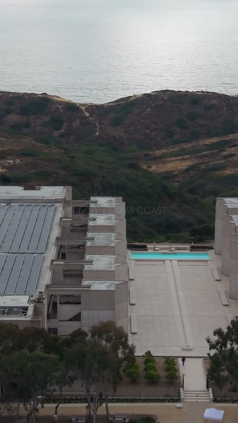 Aerial Profile of the Salk Institute Above La Jolla Shores – Low Drone Approach (Vertical)