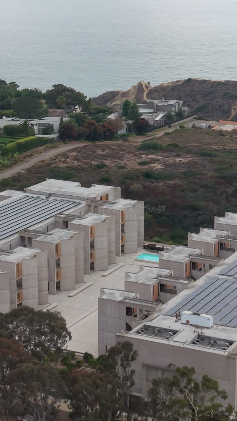 Aerial Profile of the Salk Institute Above La Jolla Shores – Birdseye Composition (Vertical)