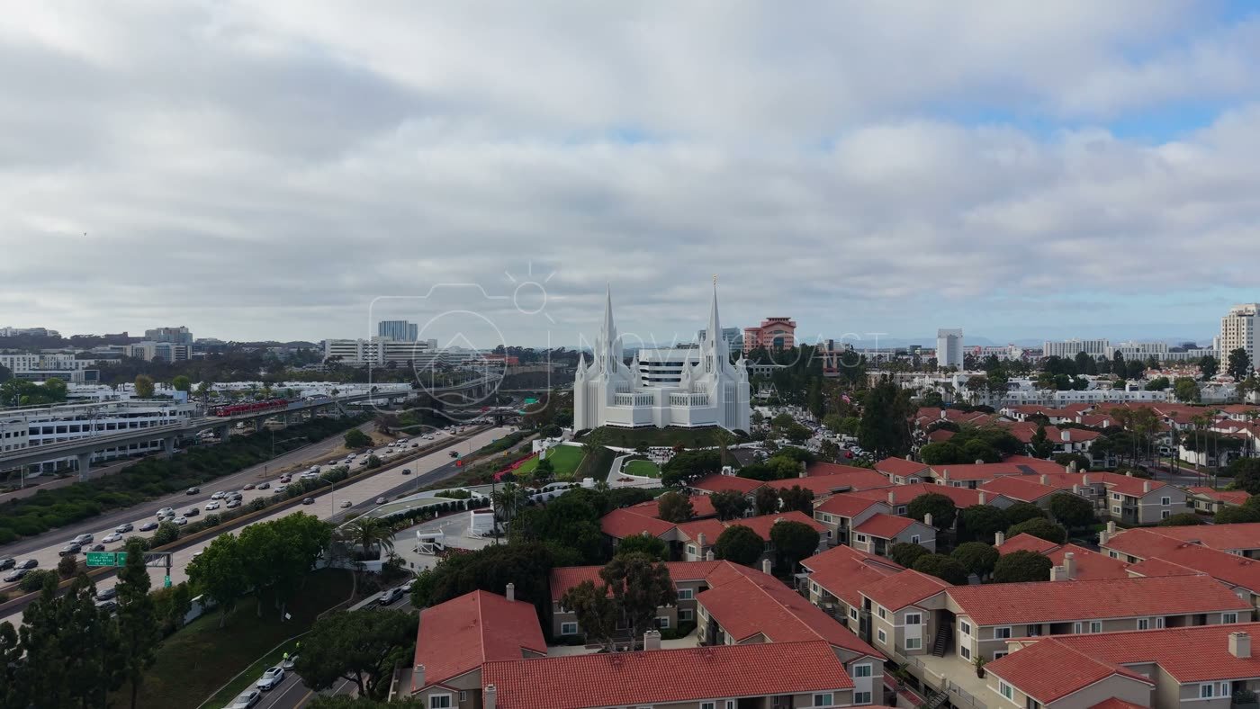 San Diego Temple Rising Beyond University City Rooftops – Aerial View