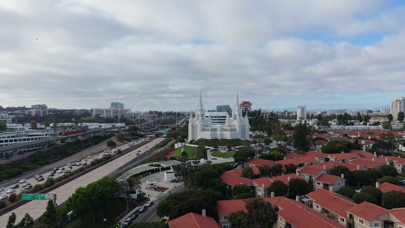 San Diego Temple Rising Beyond University City Rooftops – Wide Establishing Frame