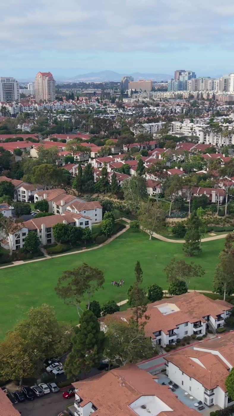 University City Neighborhood and Green Belt Beneath the UTC Skyline – Wide Establishing Frame (Vertical)