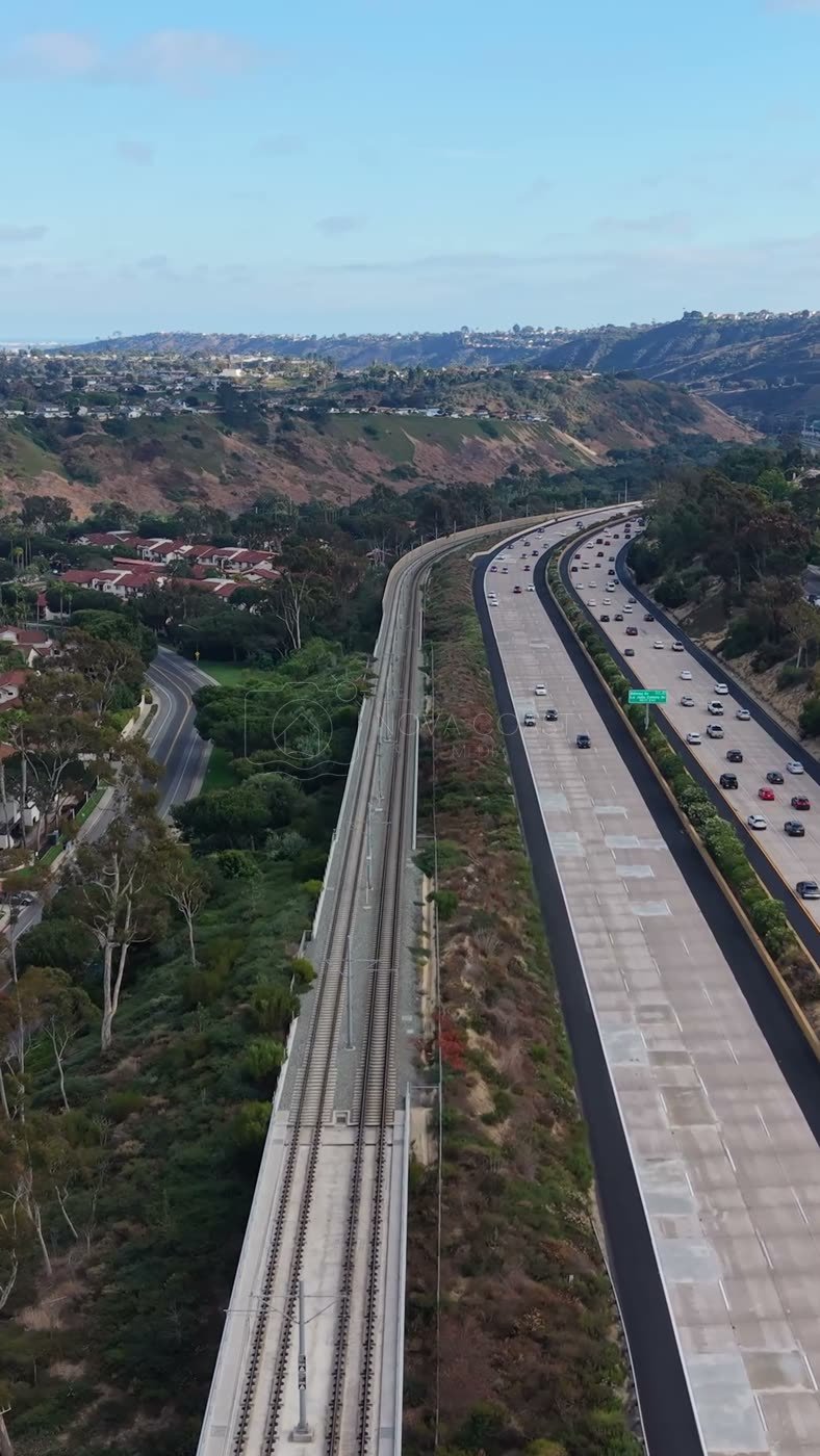 Interstate 5 and the Trolley Line Winding Through University City – Wide Establishing Frame (Vertical)