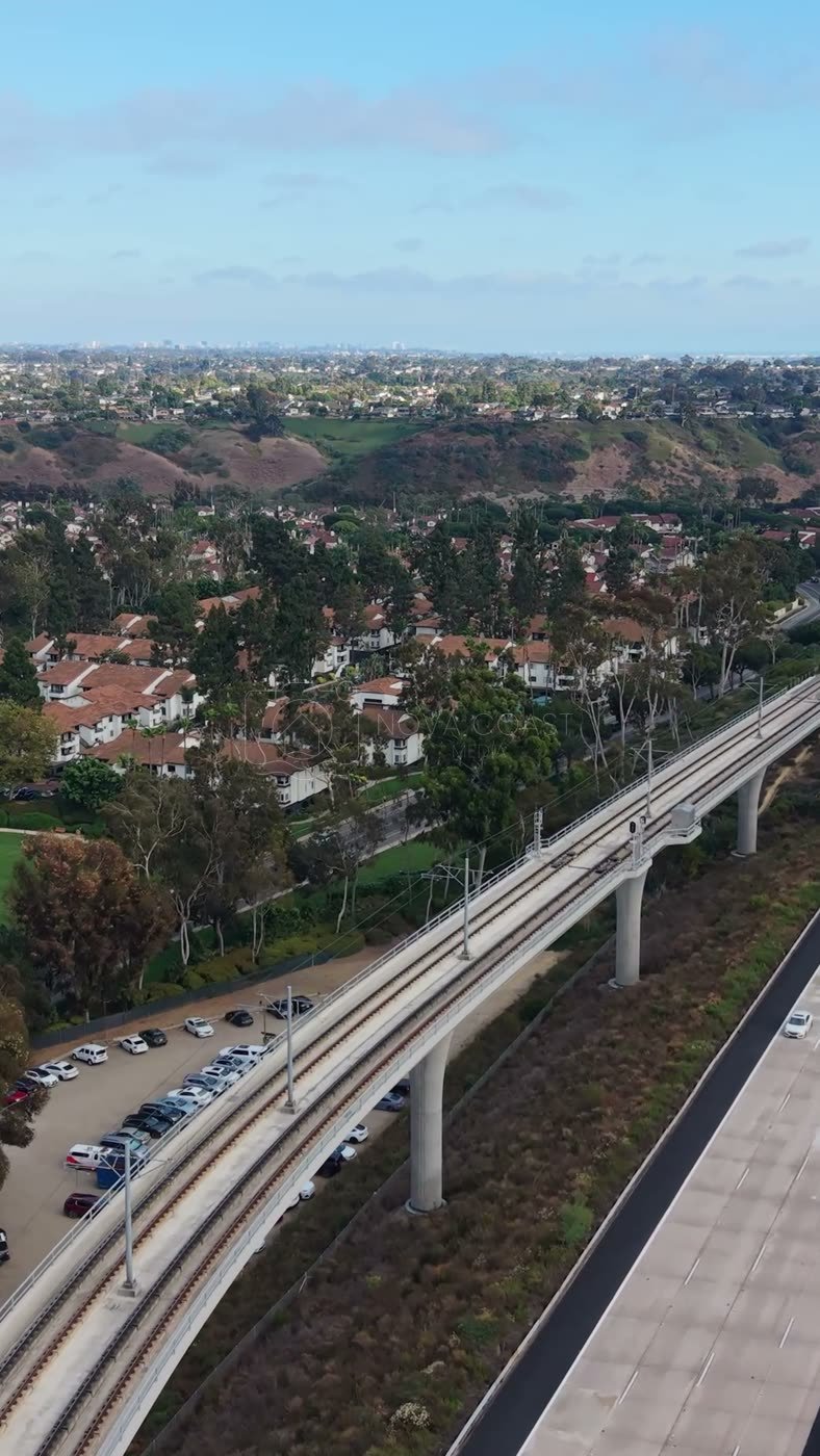 Elevated Trolley Guideway Curving Above the I-5 in University City – Overhead Detail (Vertical)