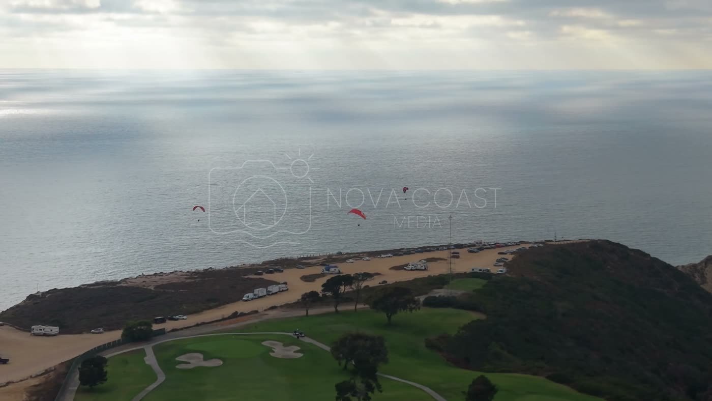 Paragliders Soaring Over the Pacific at Torrey Pines Gliderport – Overhead Detail
