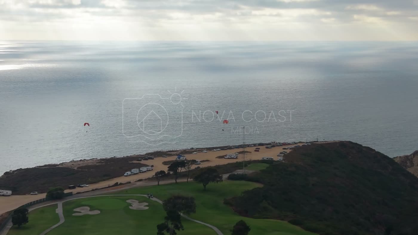 Paragliders Soaring Over the Pacific at Torrey Pines Gliderport – Golden Hour Frame