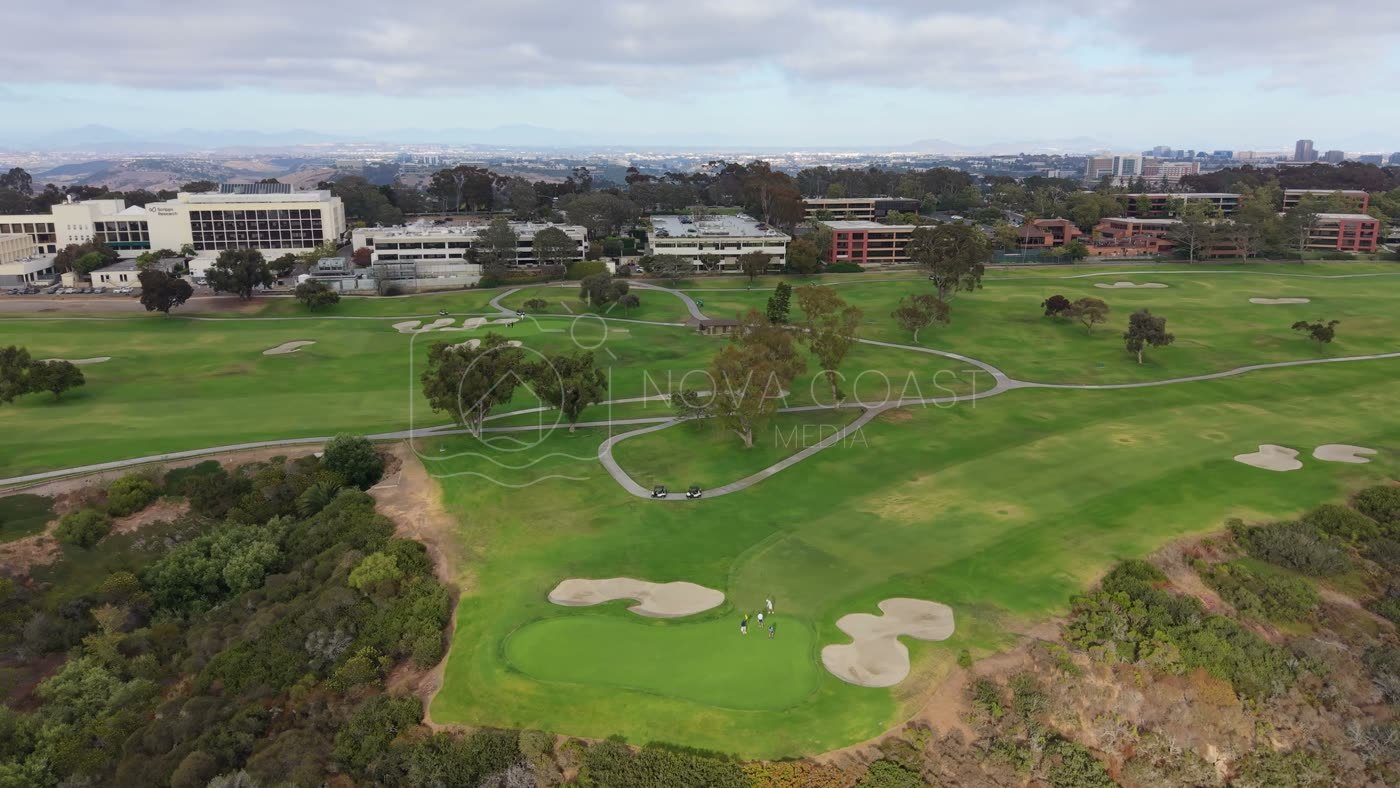 Golfers on the Green at Torrey Pines with the City Mesa Beyond – Elevated Perspective