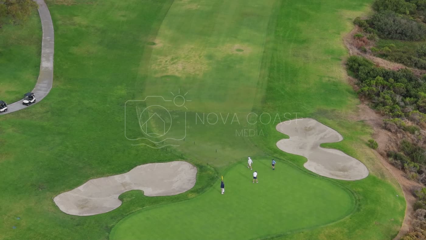 Overhead of a Torrey Pines Green Framed by Twin Sand Bunkers – Aerial View