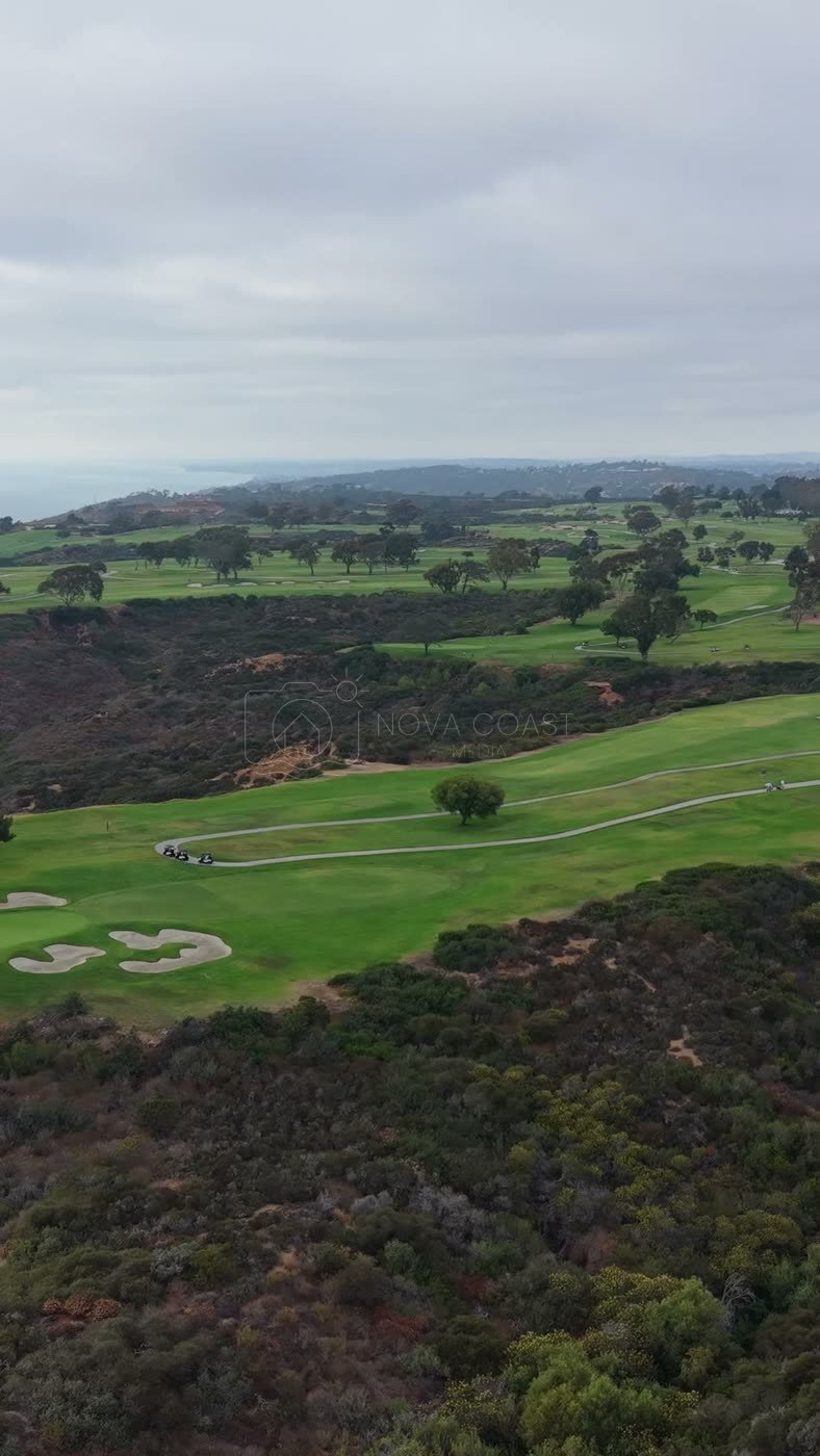 Sweeping View of Torrey Pines Golf Course and the Coastal Canyons – Aerial View (Vertical)