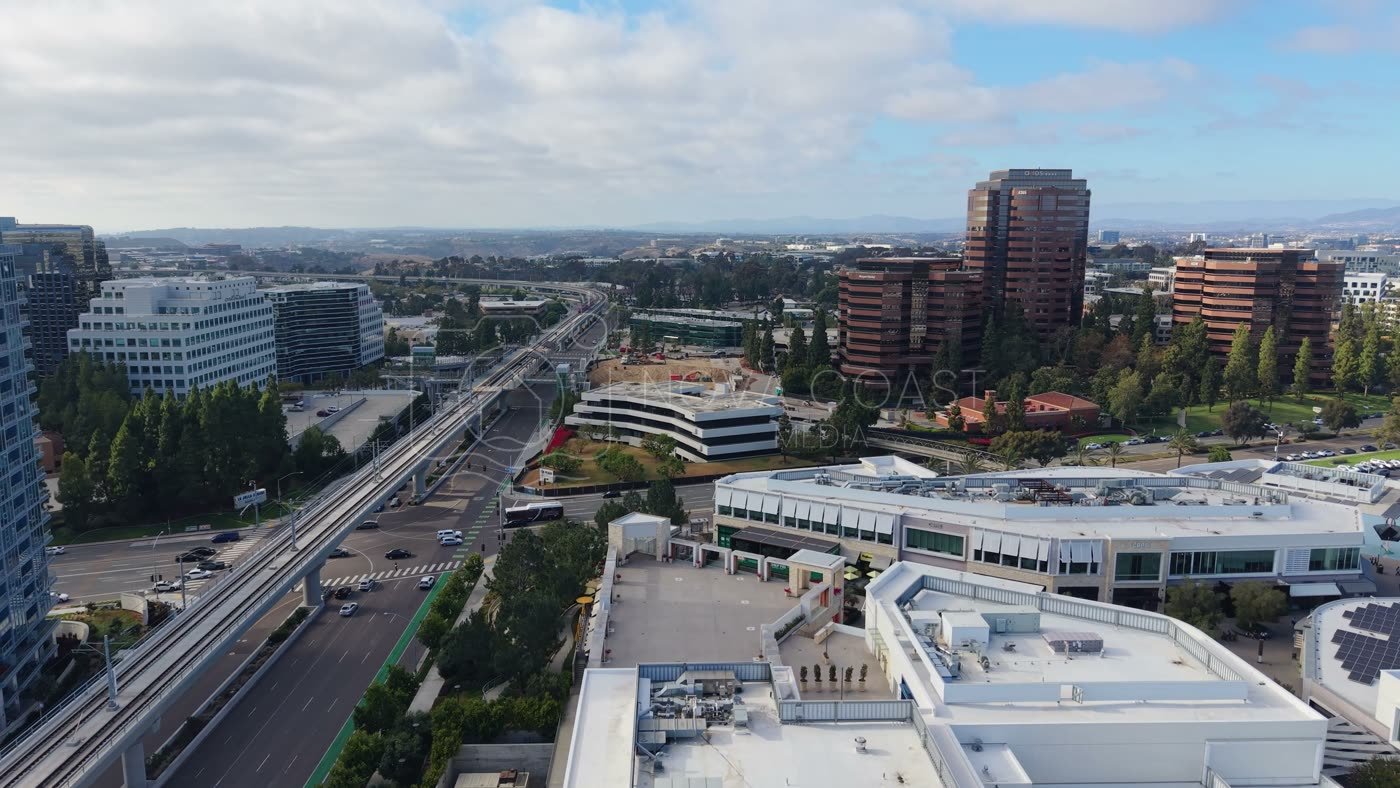 The Blue Line Trolley Threading Through University City’s Office District – Elevated Perspective