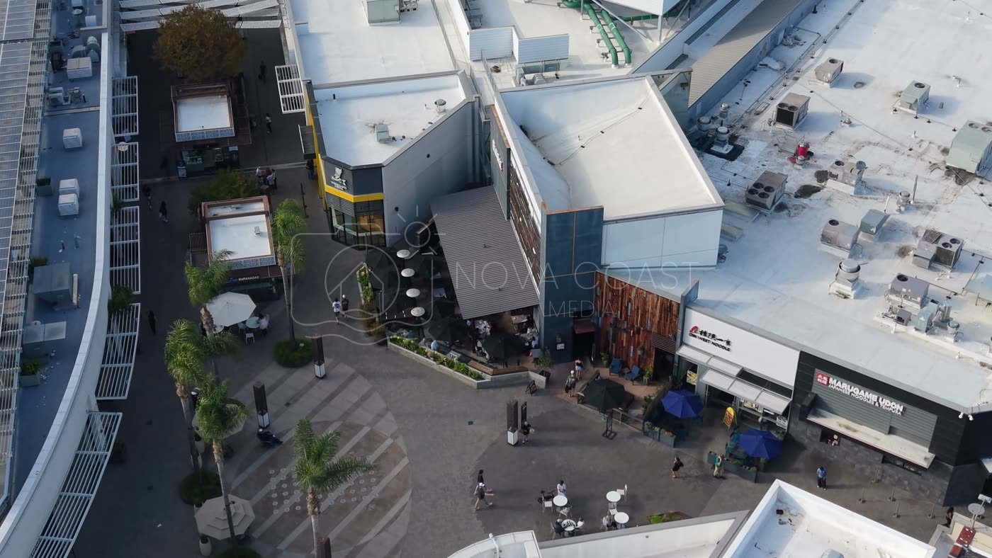 Outdoor Dining Terrace and Shops at University Town Center – Wide Establishing Frame