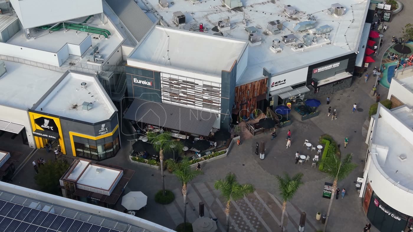 Outdoor Dining Terrace and Shops at University Town Center – Cinematic Drone Angle