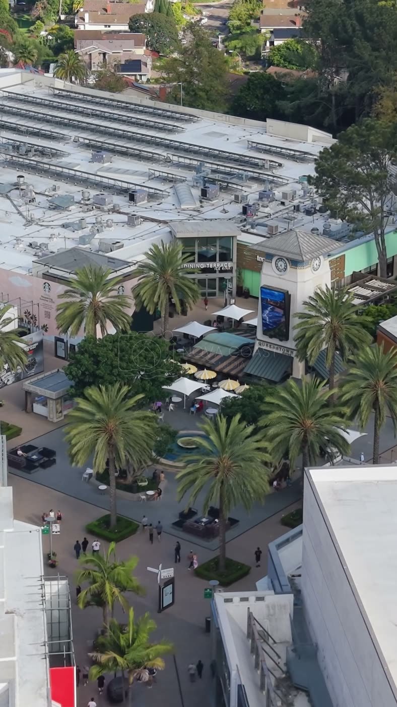 Palm-Lined Plaza and Storefronts at the Open-Air Westfield UTC – Elevated Perspective (Vertical)