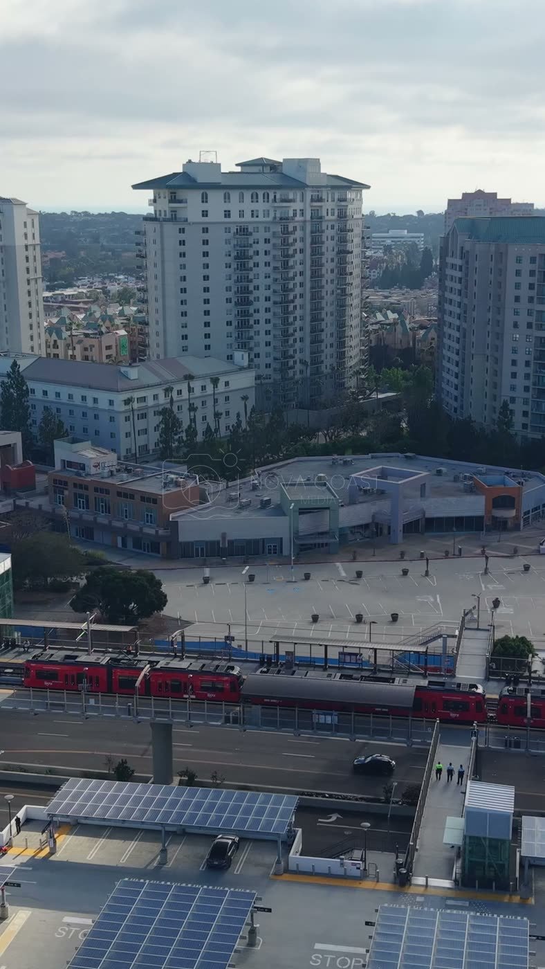 Trolley Arriving at the UTC Transit Center Below Residential Towers – Aerial View (Vertical)