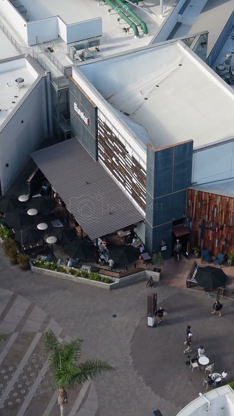 Outdoor Dining Terrace and Shops at University Town Center – Overhead Detail (Vertical)