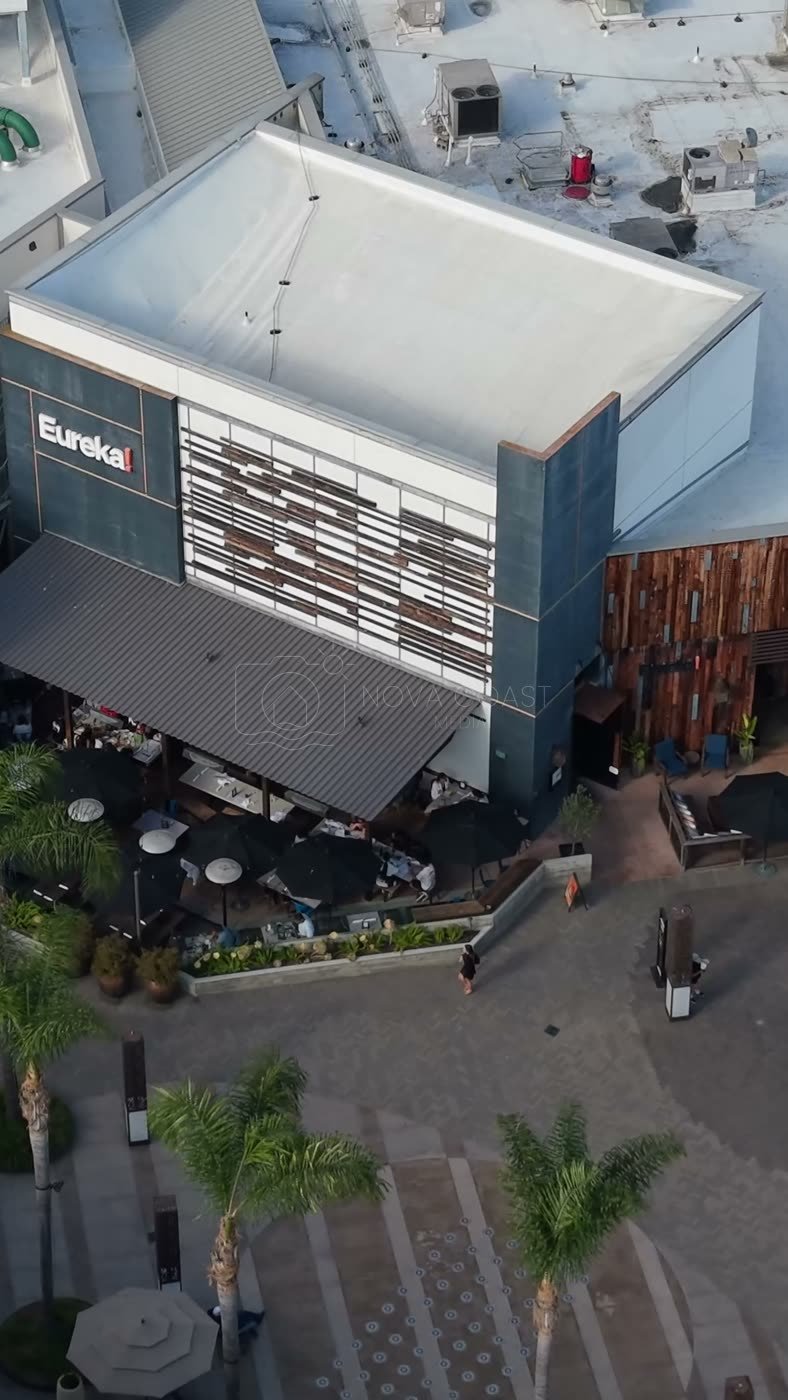 Outdoor Dining Terrace and Shops at University Town Center – High-Angle Panorama (Vertical)
