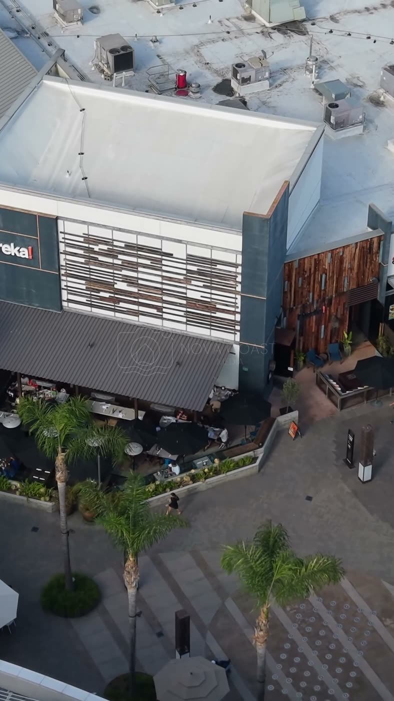 Outdoor Dining Terrace and Shops at University Town Center – Cinematic Drone Angle (Vertical)