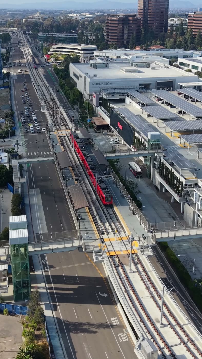 Aerial of the UTC Trolley Station and University City High-Rises – Aerial View (Vertical)