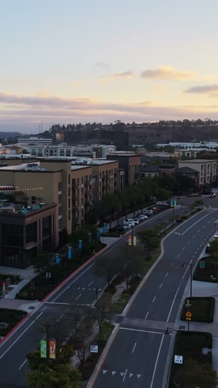 Civita Modern Mixed-Use District Along the Boulevard at Golden Hour (Vertical)