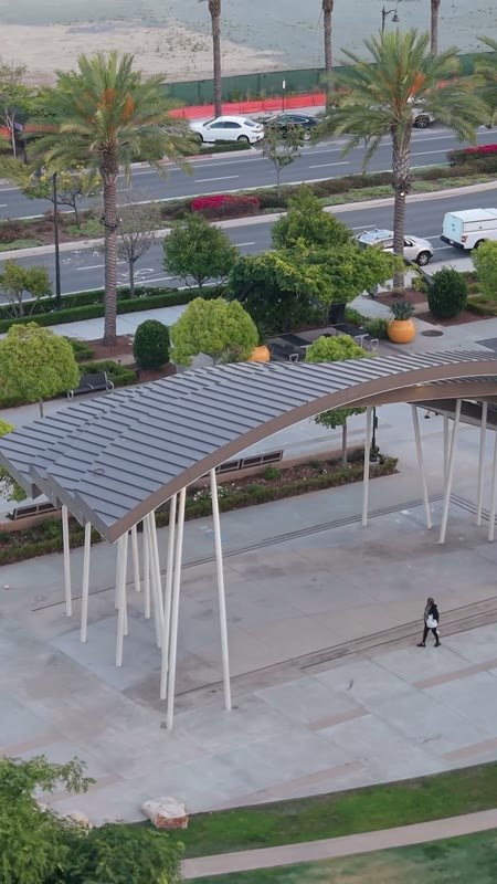 Architectural Detail of Civita Park’s Arched Canopy and Palm Plaza (Vertical)