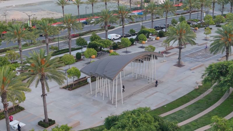 Architectural Detail of Civita Park’s Arched Canopy and Palm Plaza – Overhead Detail