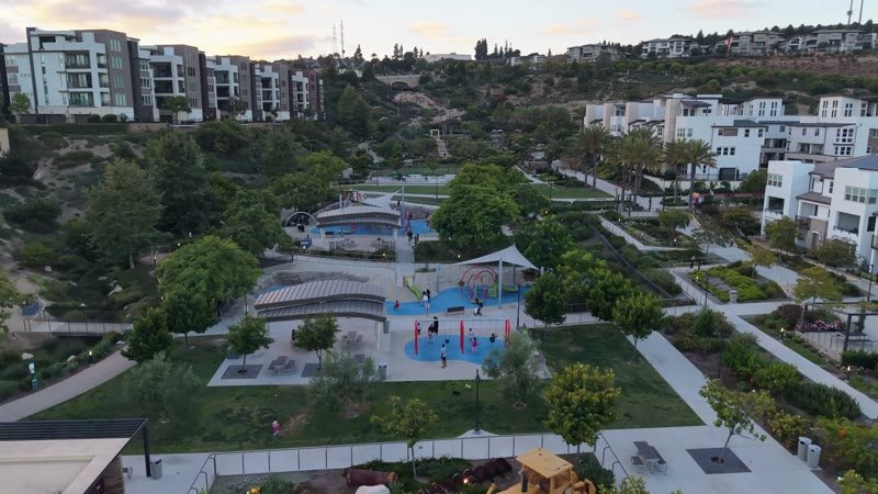 Civita Park Basketball Courts Framed by Townhomes and Sunset Hills – Cinematic Drone Angle
