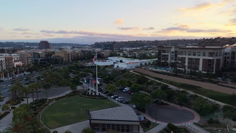 Civita Hilltop Residences Above the Community Garden Terraces at Dusk – Golden Hour Frame