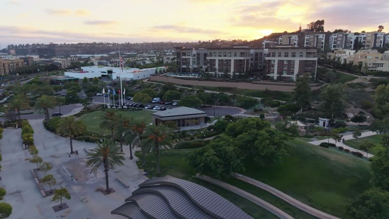 Civita Palm-Lined Boulevard and Park as the Sun Sets Over the Ridge – Overhead Detail
