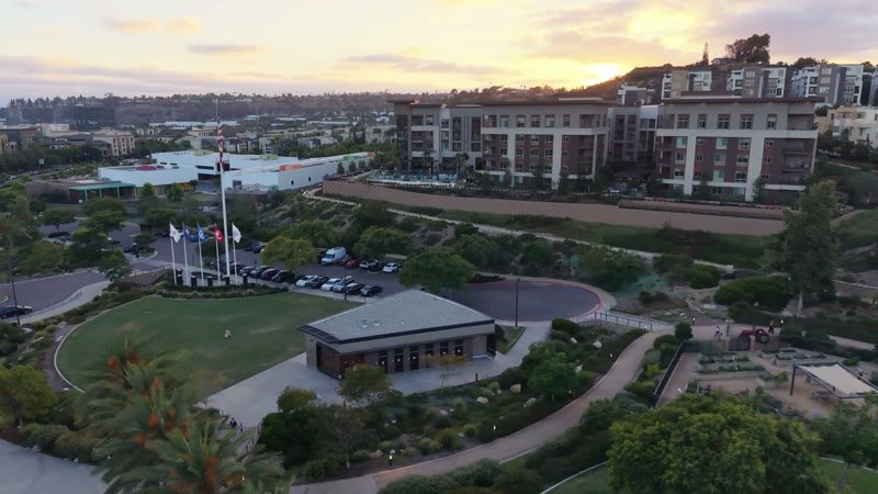 Civita Palm-Lined Boulevard and Park as the Sun Sets Over the Ridge – Golden Hour Frame