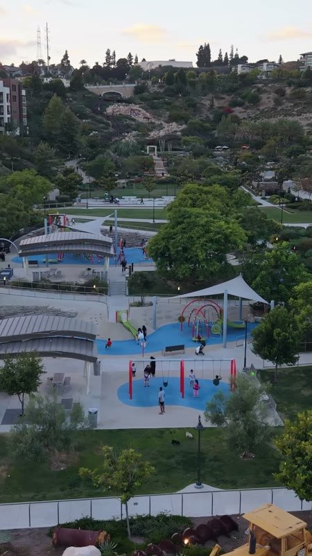 Civita Park Basketball Courts Framed by Townhomes and Sunset Hills – Cinematic Drone Angle (Vertical)