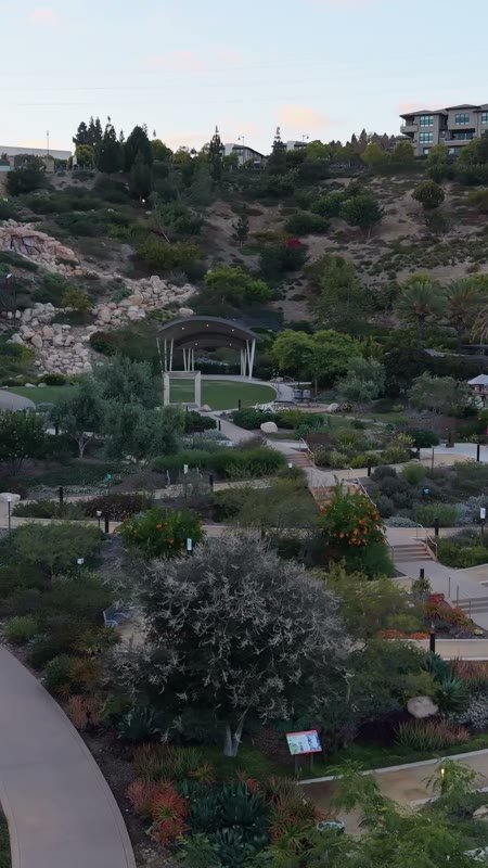 Civita Terraced Botanical Gardens and Winding Pathways at Twilight – Golden Hour Frame (Vertical)